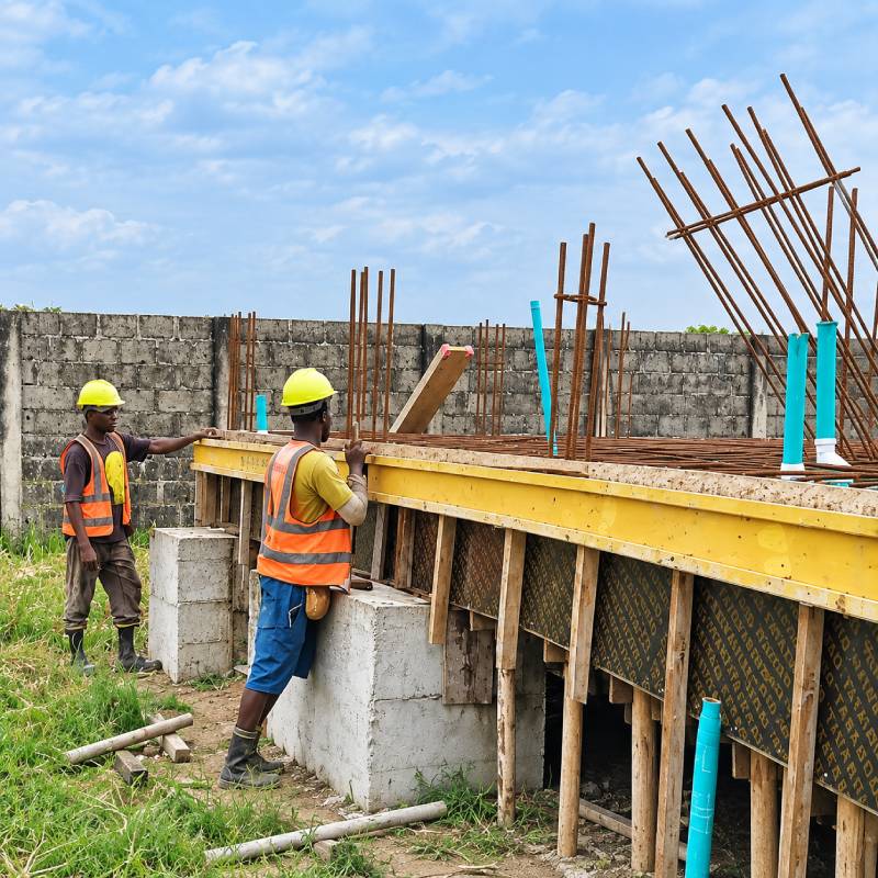 H-beam installed along the beam side formwork to provide additional support and maintain formwork alignment prior to concrete casting